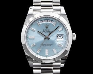 Silver and light blue Rolex